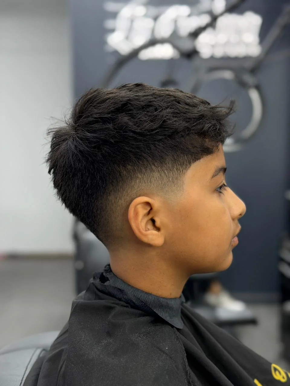 Corte degradado juvenil realizado en La Cuadra Barber Studio